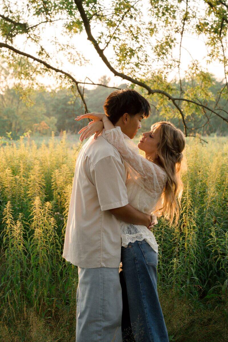 Couple embracing at golden hour