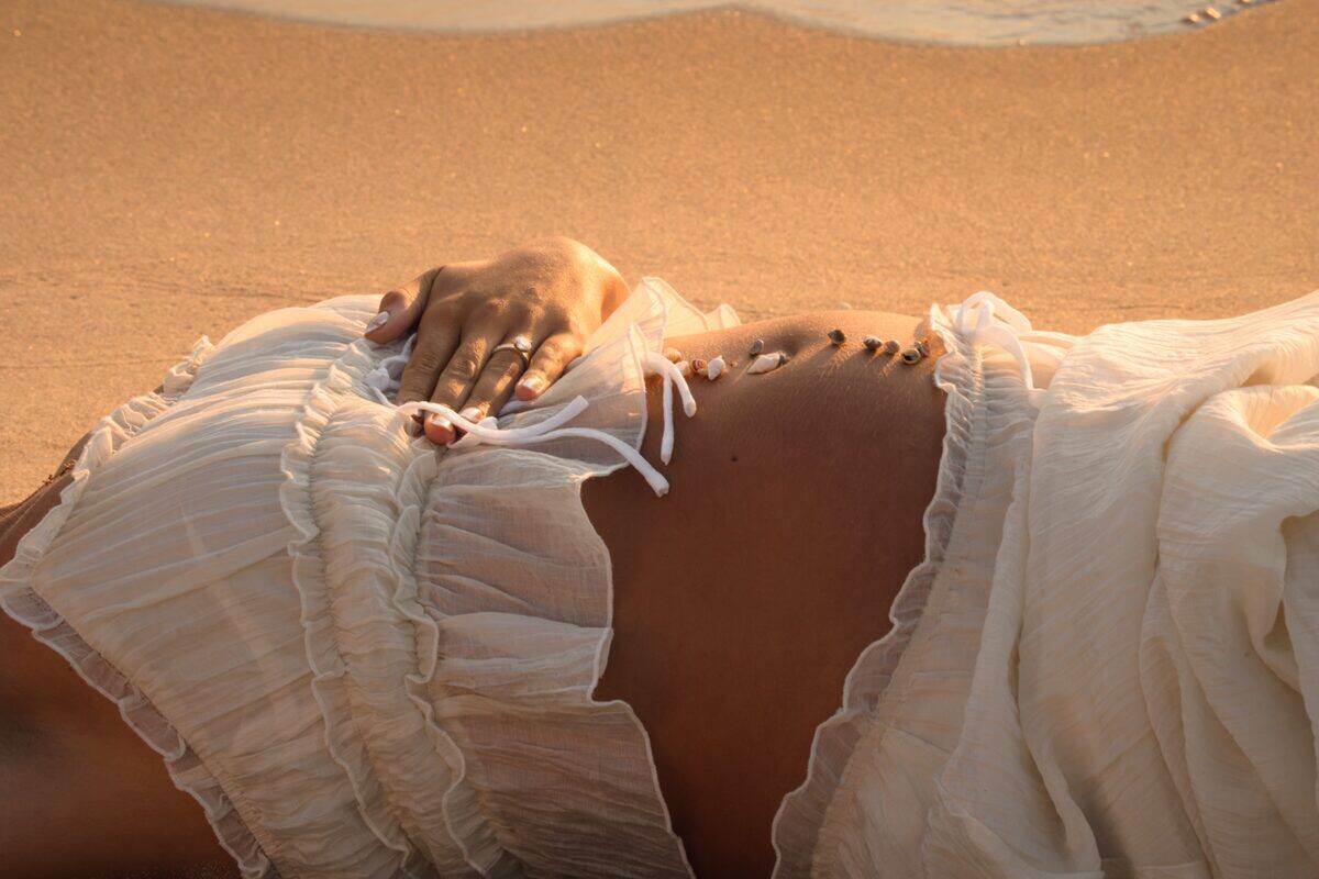 Sunlit maternity detail portrait