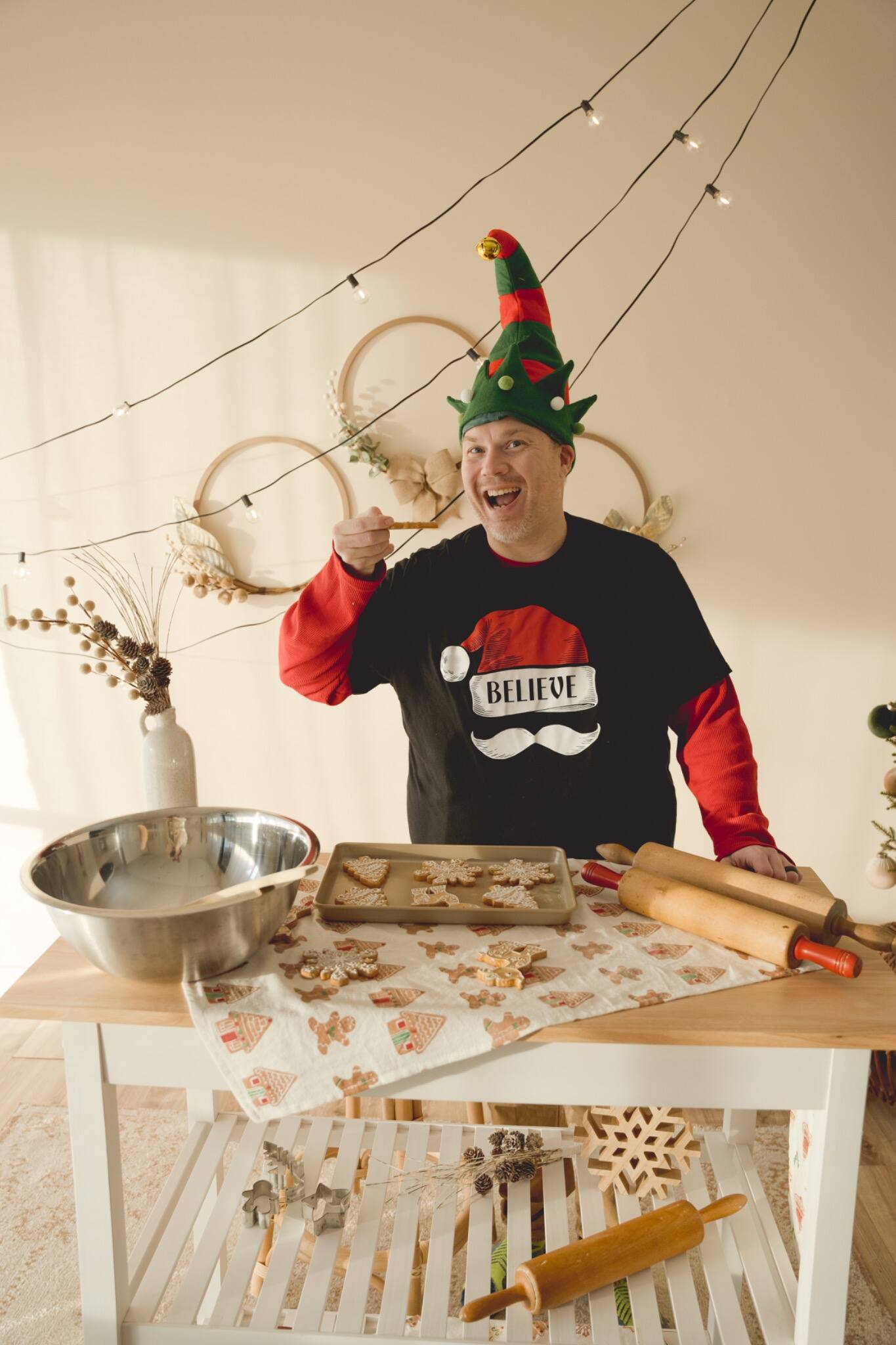 Chris baking holiday cookies