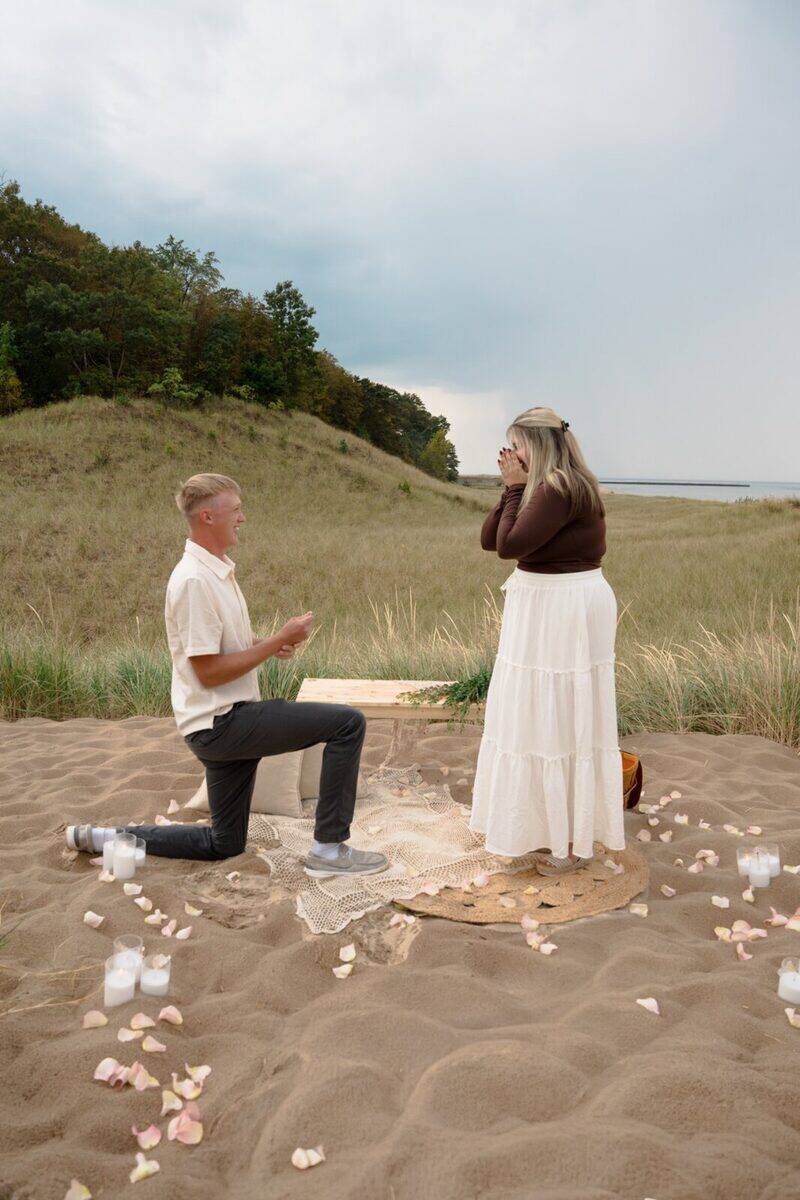 A surprise beach proposal photographed by Jess Nicole Creative