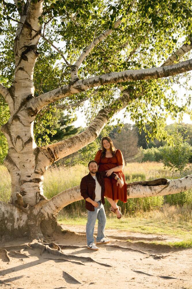 Proposal moment framed by a tree