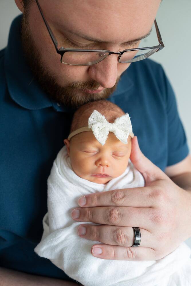 Father holding his newborn