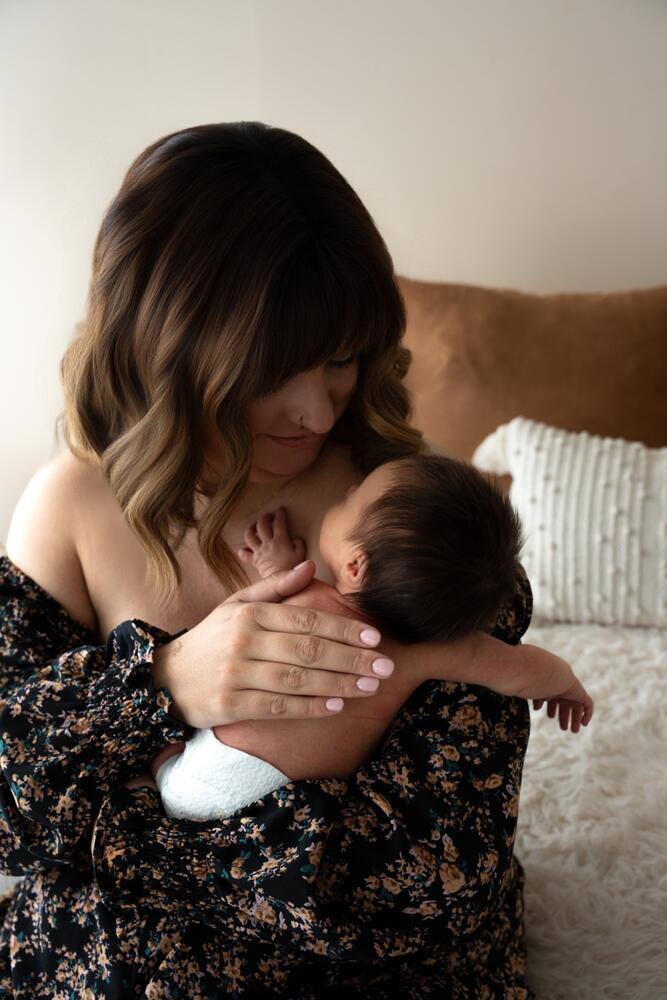 Mother cradling her baby