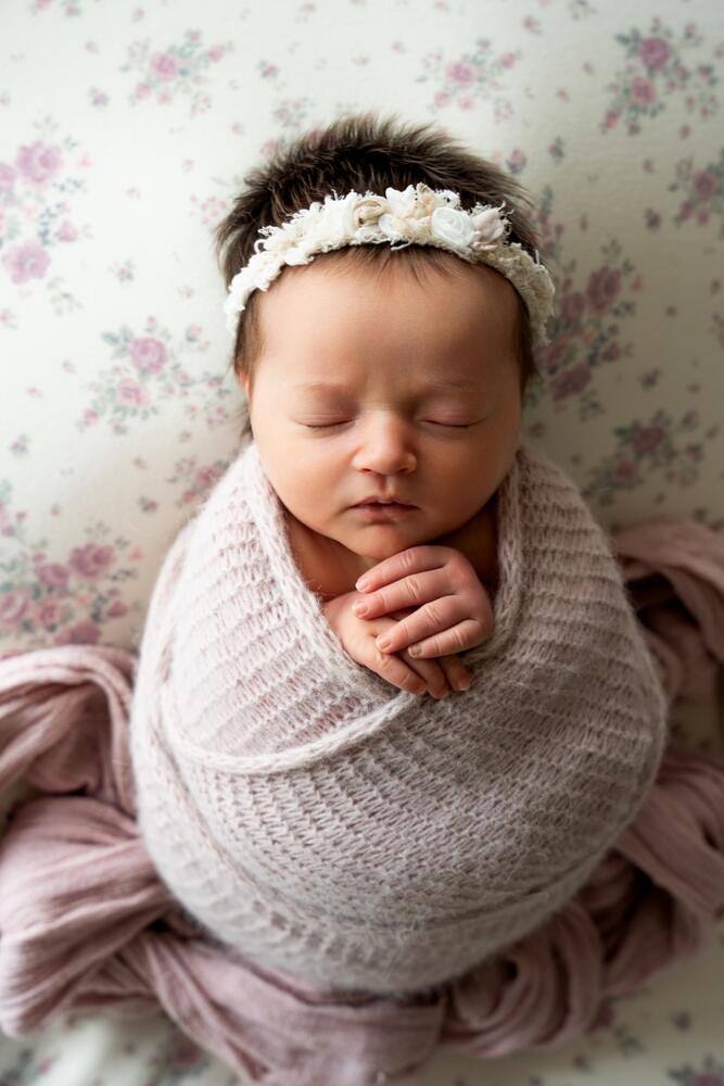 Swaddled newborn portrait