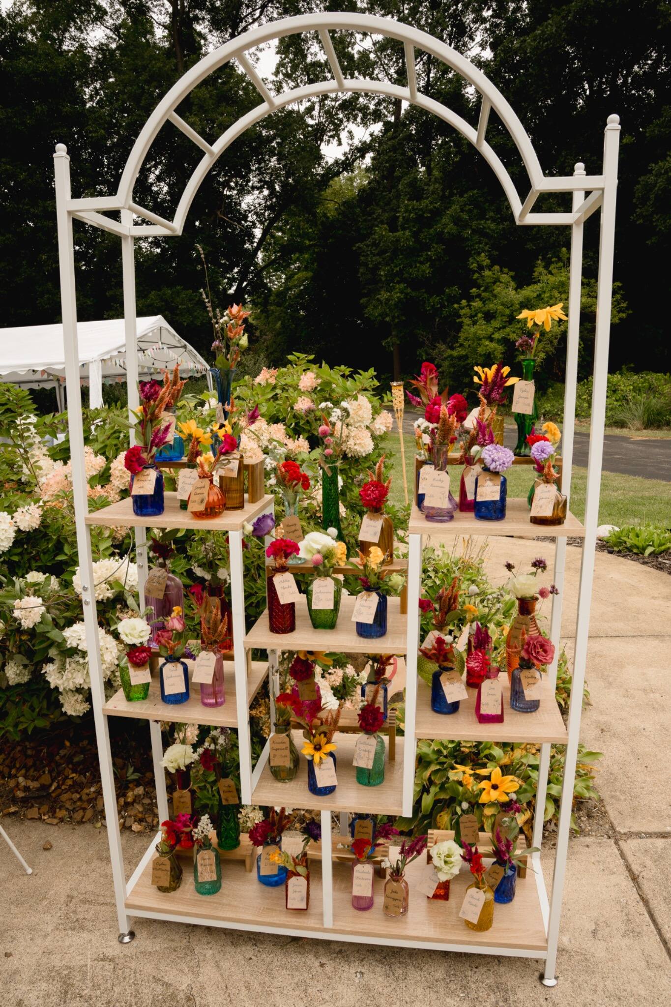 Colorful outdoor wedding flower display