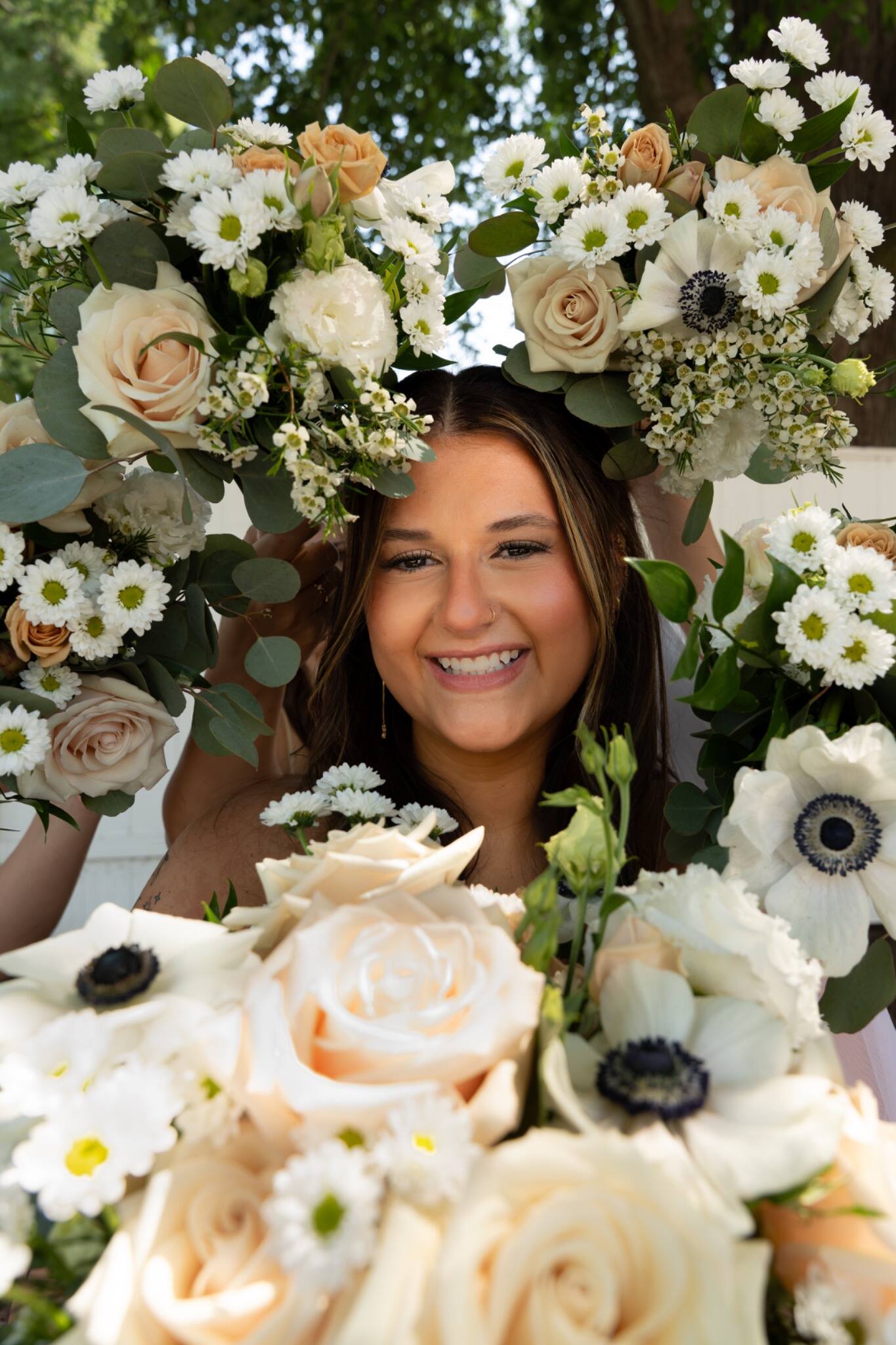 Bride framed by her wedding bouquet