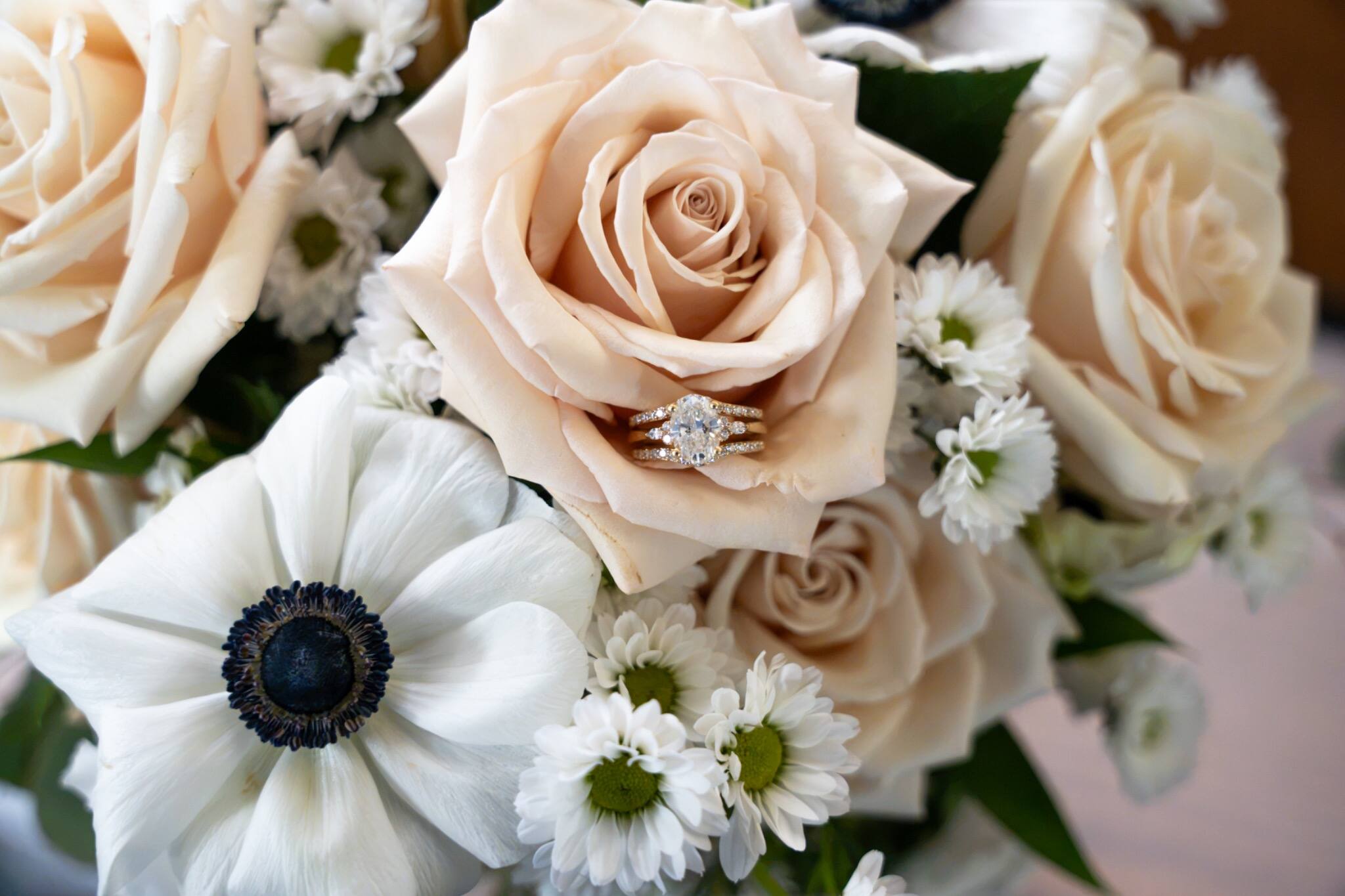 Ivory rose and anemone bridal bouquet detail